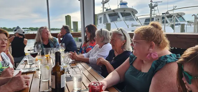 Everyone at the table, all smiles