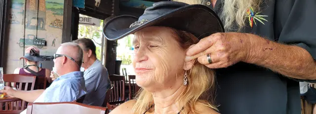 A close, happy moment between John and Lori