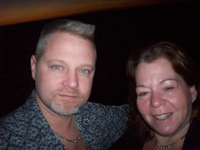 couple closeup photo dark lighting