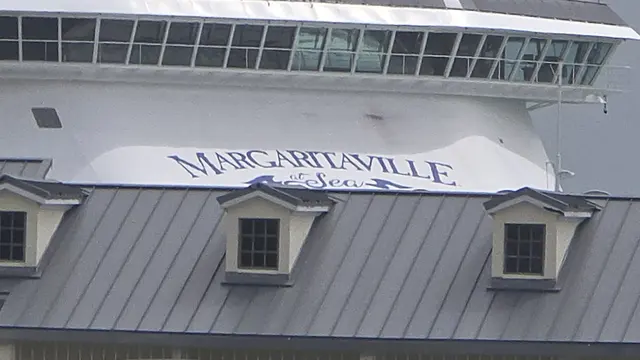 The Margaritaville cruise ship looms over the rooftops.