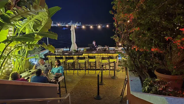 A festive night out at a waterfront bar to cap off the trip.