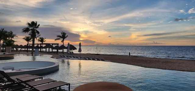 Dawn breaks over the infinity pool on one of the last mornings.