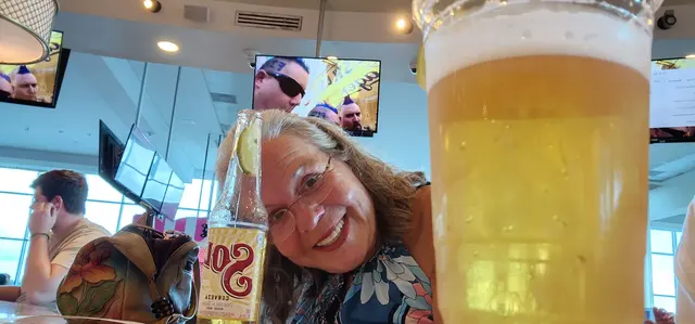 One last cold one at the airport before heading home — trip complete.