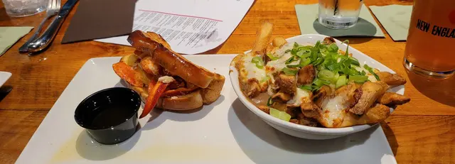 Lobster roll and poutine fries - New England eating done right
