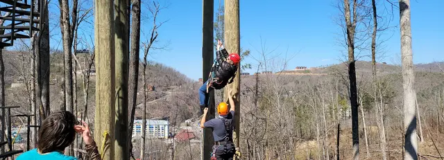 A steady hand on the rappel line, Gatlinburg below