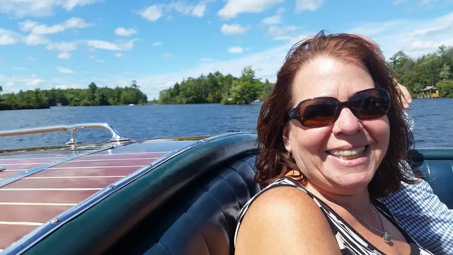 Cruising past a lakeside cabin on Lake Winnipesaukee