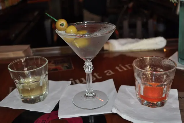 three cocktails on bar counter