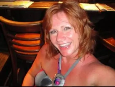 woman in bikini top at restaurant closeup