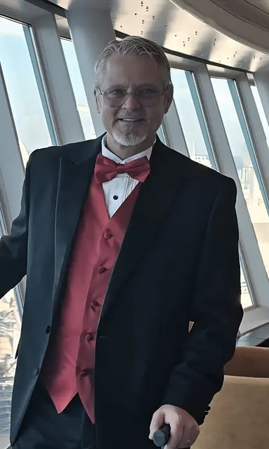 John dressed sharp for formal night.
