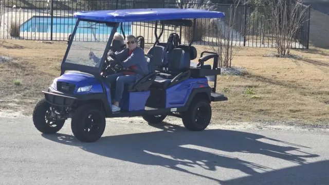 Cruising around in the golf cart.