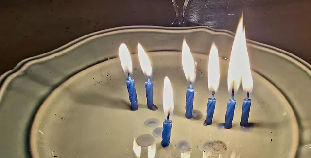 Blowing out the candles - a birthday during the trip.