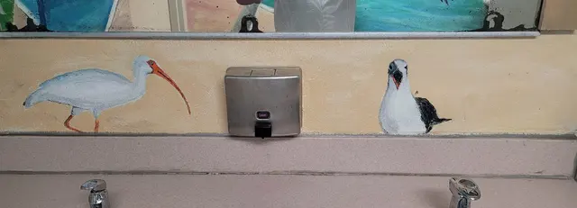 Lori and a friend enjoying drinks at a local bar