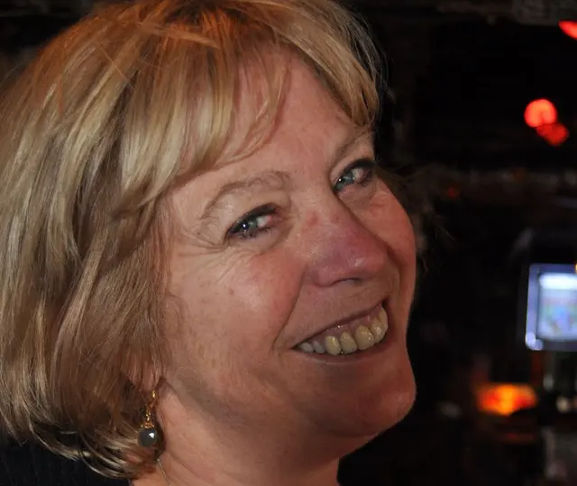 woman smiling closeup at bar