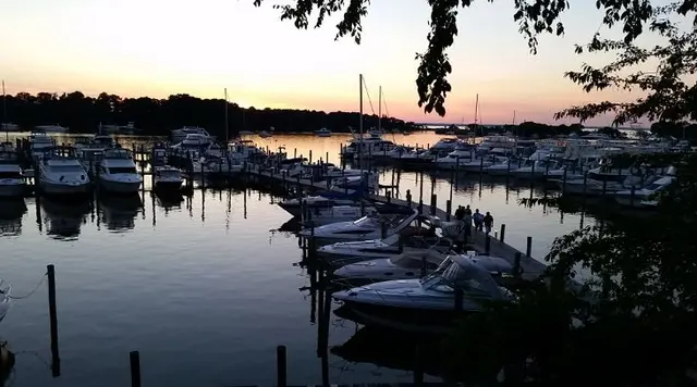 scenic marina at sunset with boats
