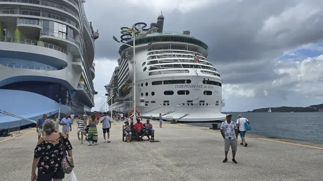 Three cruise ships docked together in St. Maarten.