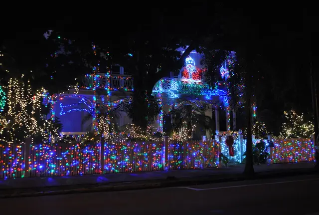 decorated house with holiday lights at night