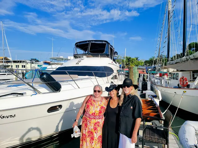Group shot in front of the boats before the sunset cruise