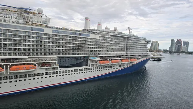 The ship pulling away from port, setting sail from Miami.