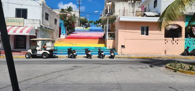 Colorful stairways add a pop of character to the streets of Playa del Carmen.