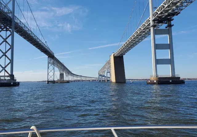 Chesapeake Bay Bridge spans viewed from boat; scenery