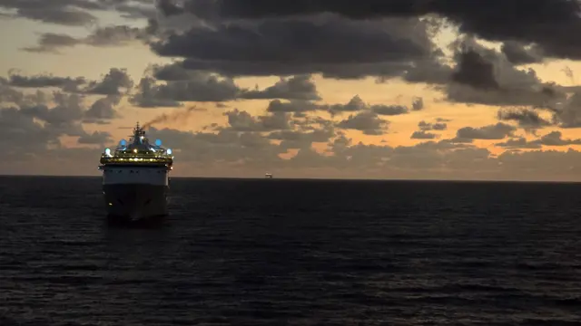 A stunning sunrise over the Caribbean from the ship's deck.